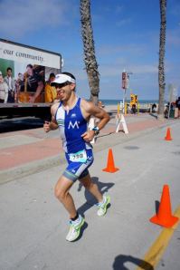 Pain smile for Whitney, heading back for more on lap 2